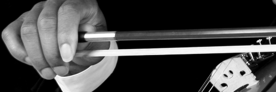 Thalen Kane cut out image hand on violin